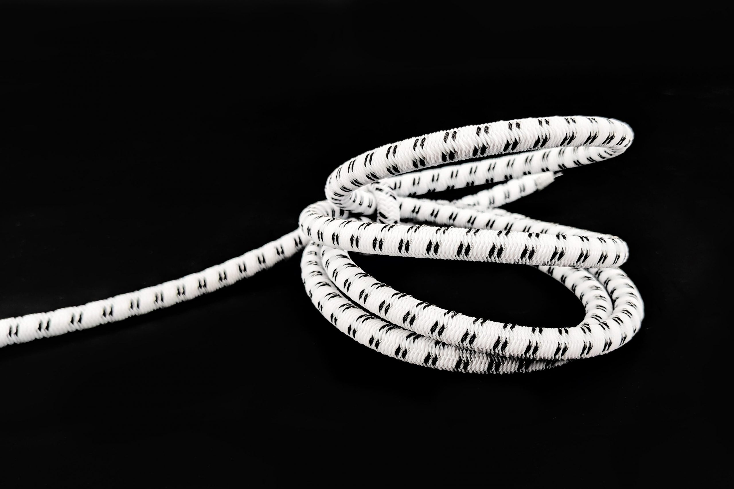 flat bungee cord, bungee cord on black background